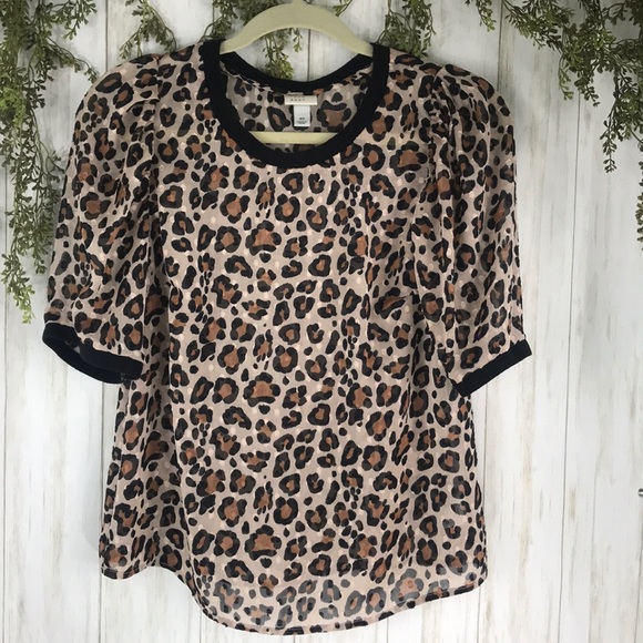 Leopard Print semi sheer top. XS